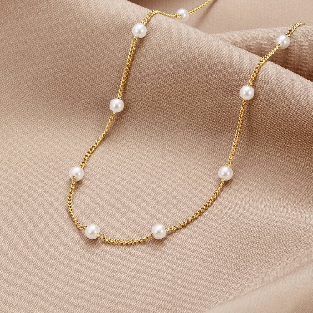 Silvia | Collar atemporal dorados con ojos de perla